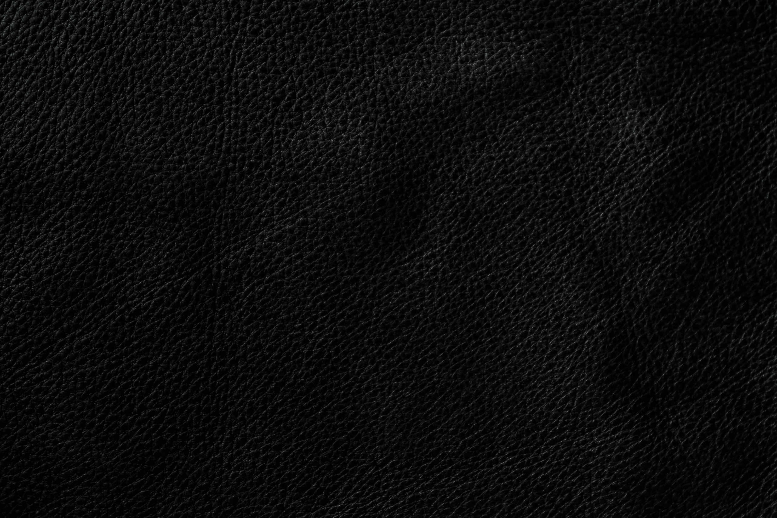 Black leather background.